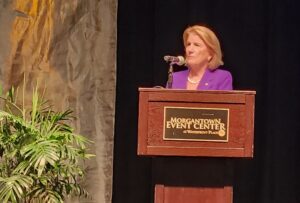 Capito addresses conference in a city on edge from layoffs, funding cuts